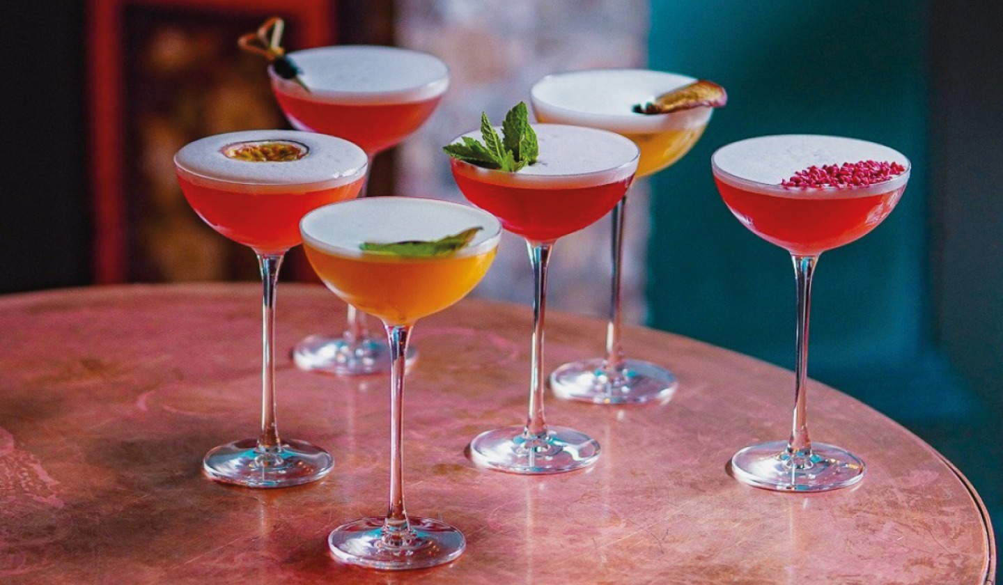 cocktails in tall stemmed glasses